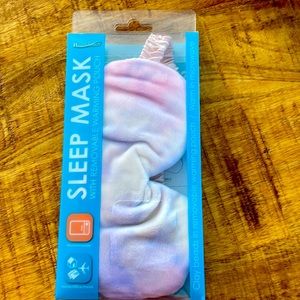 Sleep mask with removable warming pouch